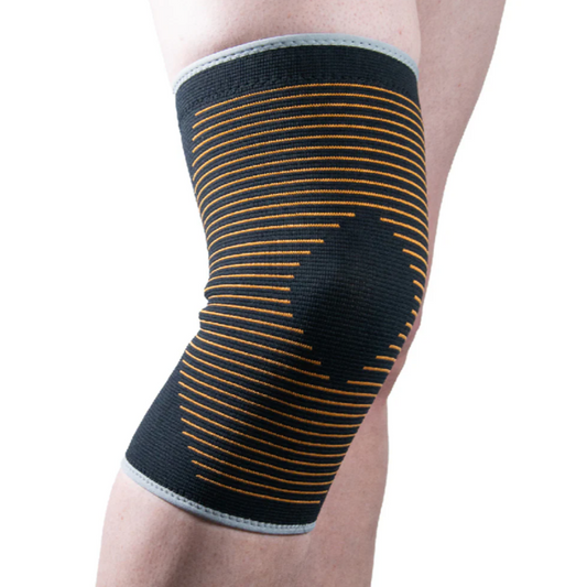 Copper compression knee sleeve on leg