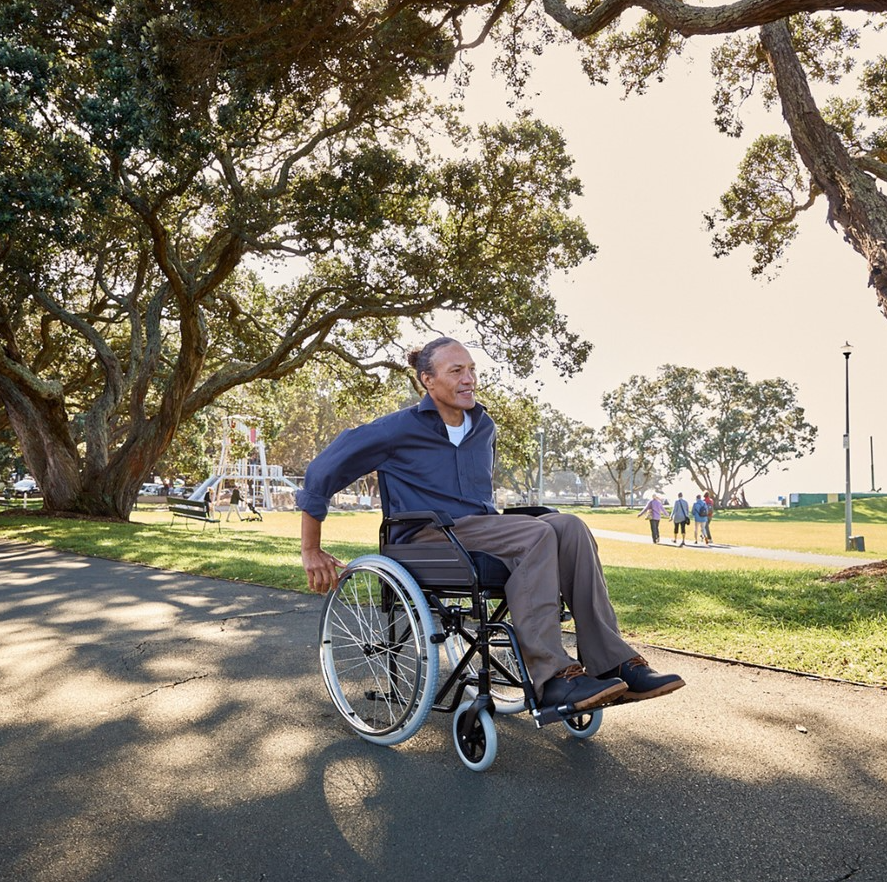 Self propelling manual wheelchair