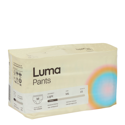 A package of Luma Pants disposable underwear in the 'Light' size, featuring a cream-colored box with black text and a subtle rainbow gradient on the right side.