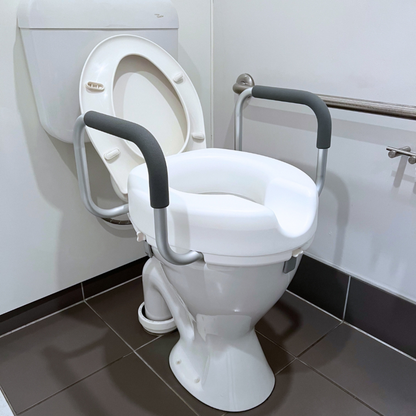 Raised toilet seat with armrests