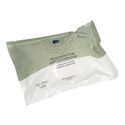 Shampoo cap with conditioner (rinse-free)