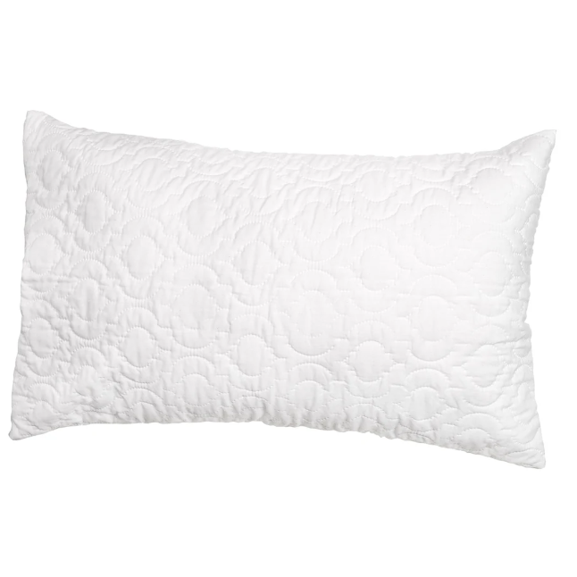 White quilted pillow on a white background